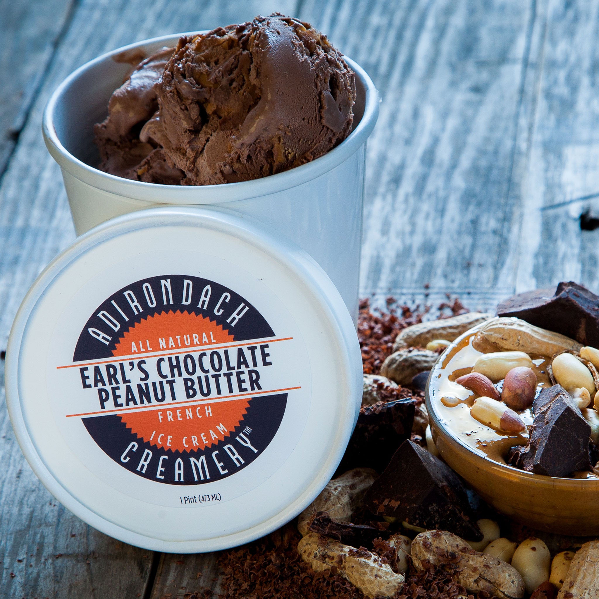 Earls Chocolate Peanut Butter Ice cream container with Adirondack Ice Cream Creamery label on a wooden surface