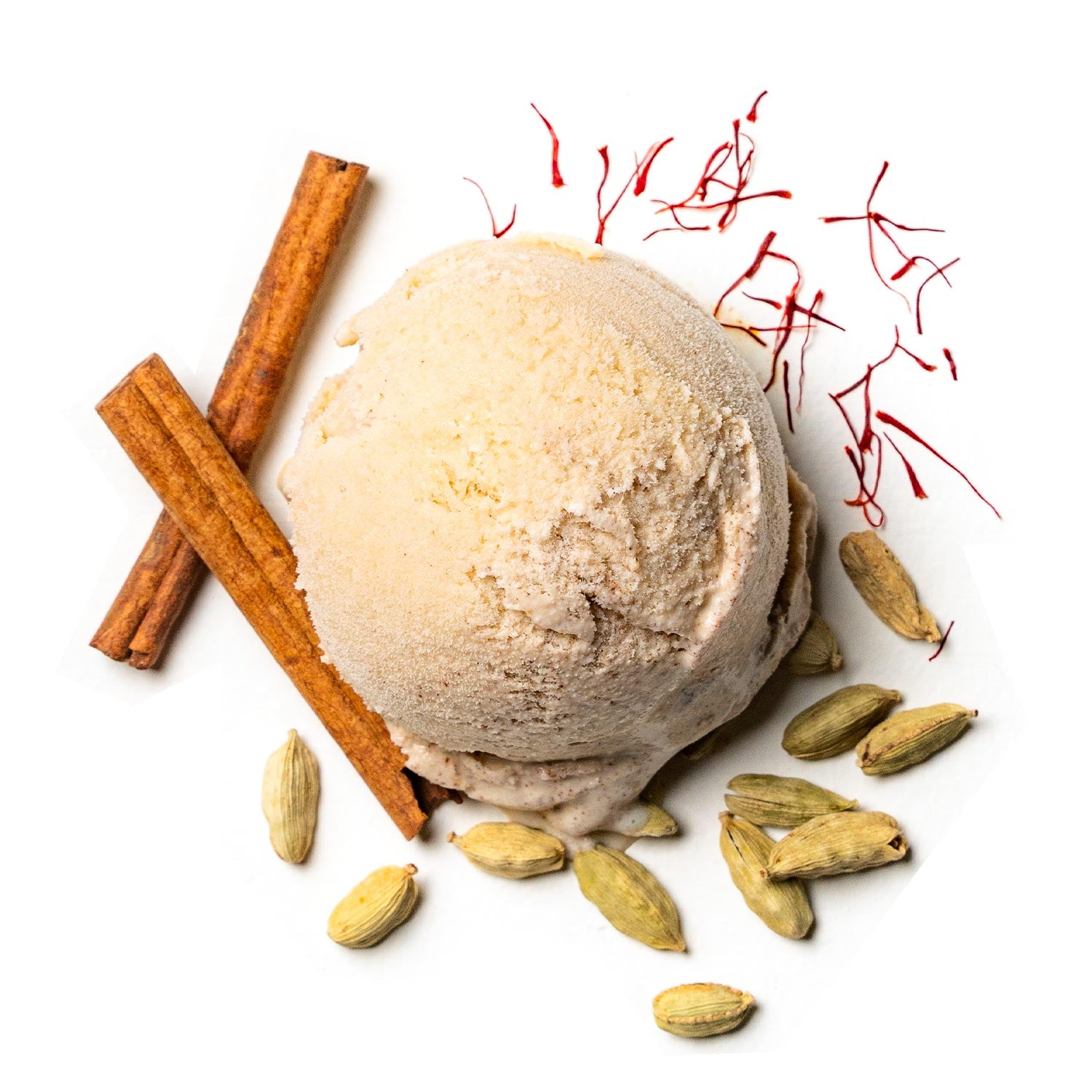 Kashmir Kahwa Ice cream scoop with cinnamon sticks and cardamom pods on a white background