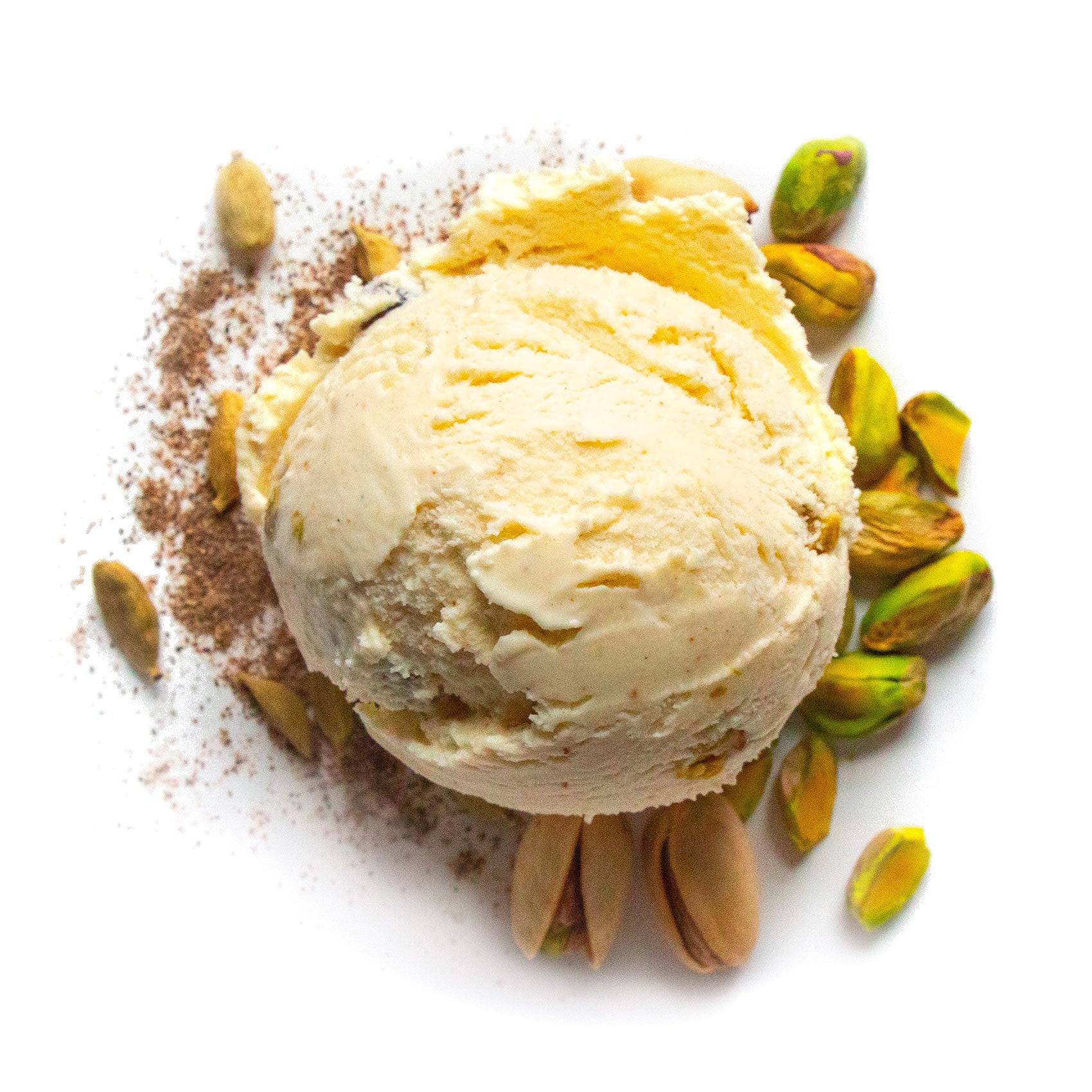 Ice cream ball with pistachios and cinnamon on a white background